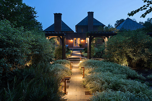 7 Path Lights outside house walkway at night