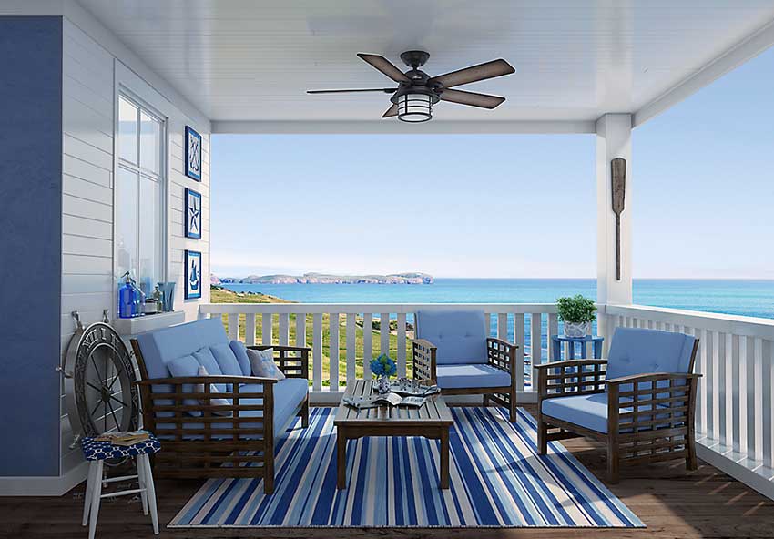 one coastal outdoor ceiling fan hung under covered patio