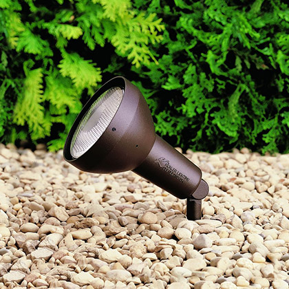 one line voltage spotlight installed outdoors