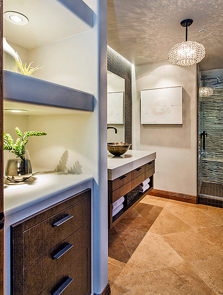 two recessed lights installed in bathroom shelves