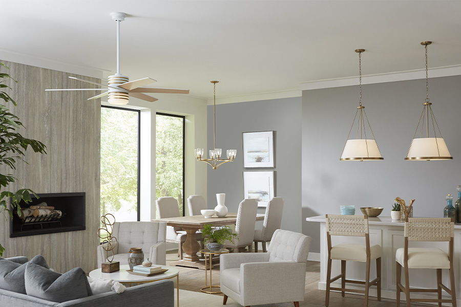 one ceiling fan, new traditional dining room light, and two pendant lights in open floor plan living room