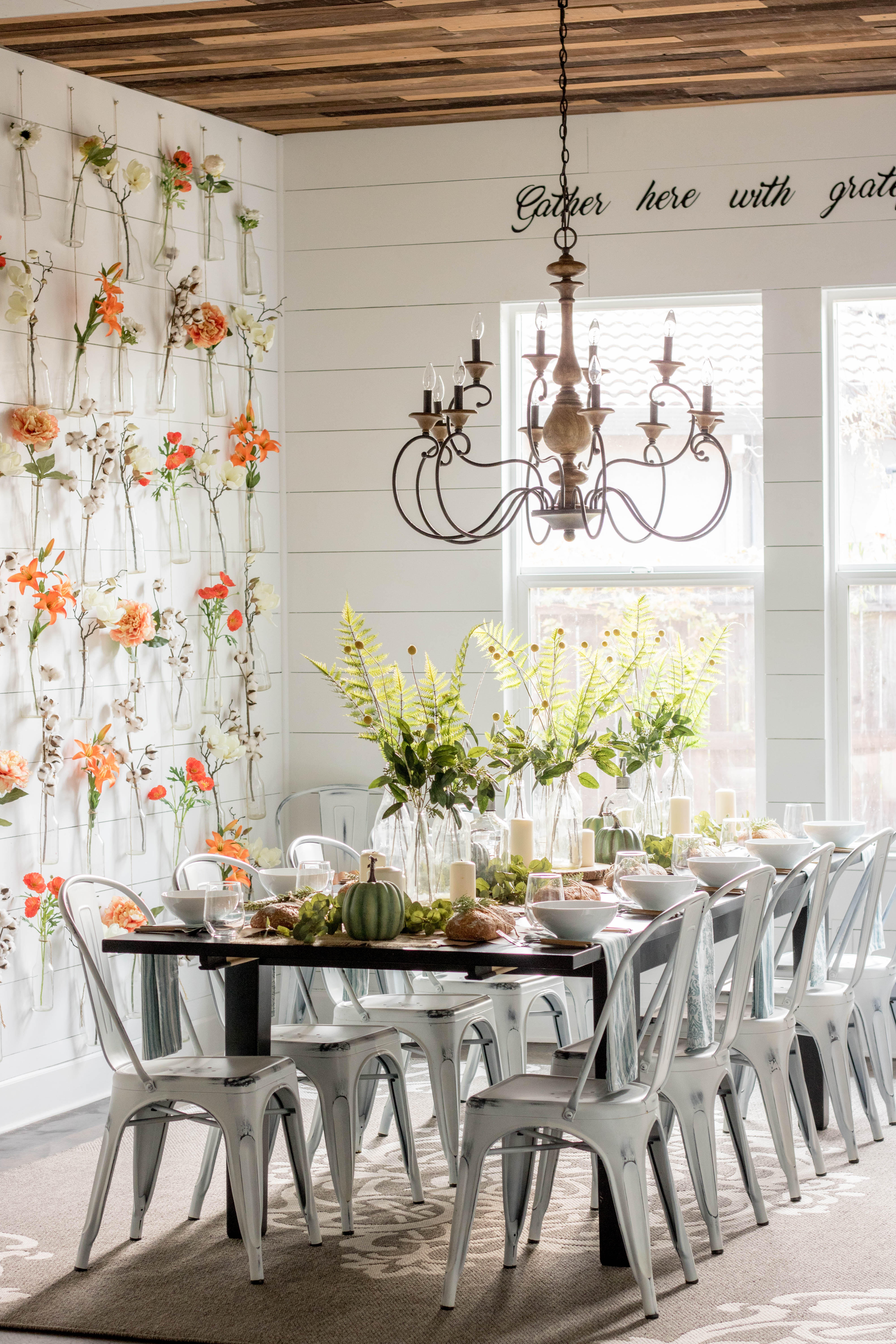 12-light 2-tier chandelier over long dining table