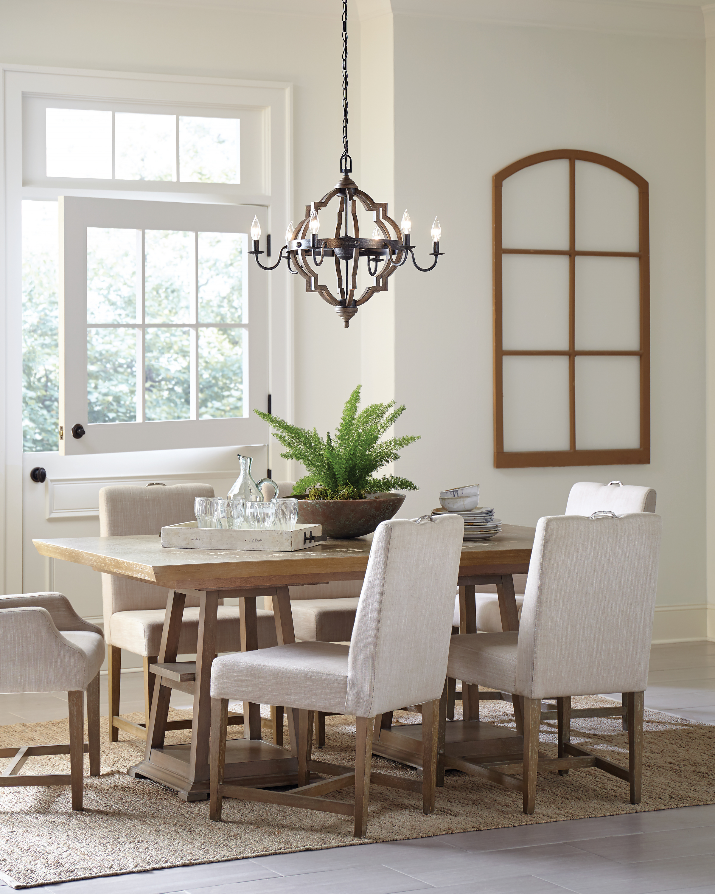 6-light rustic chandelier over dining table