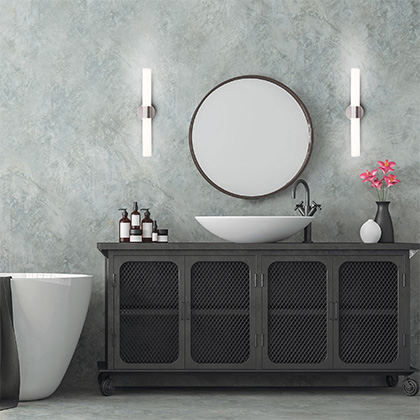 two bath vanity lights hung vertically over a bath vanity
