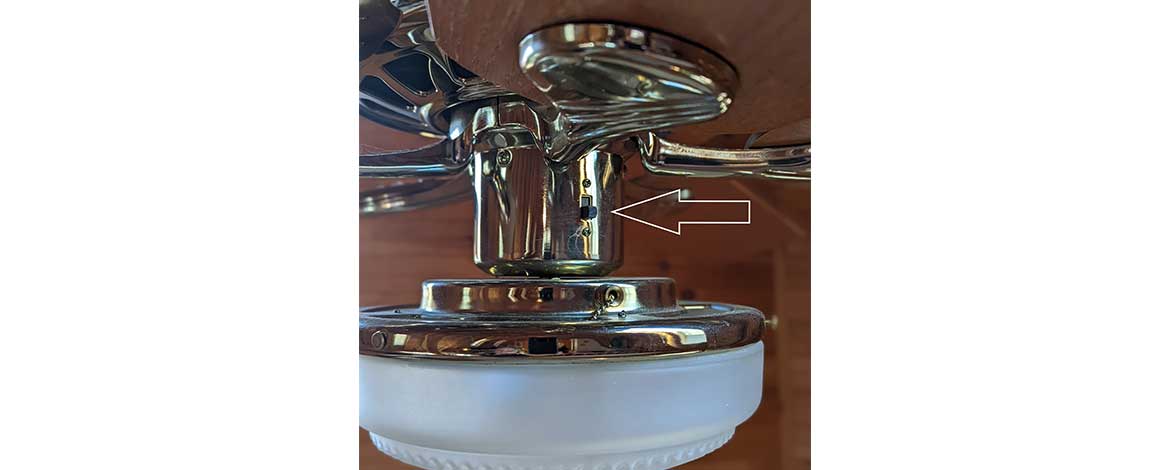 ceiling fan switch to run the fan in reverse