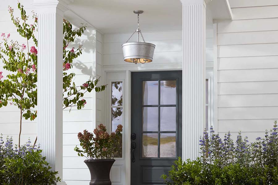 white home with hanging outdoor light