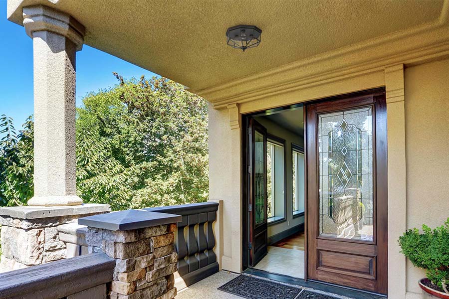 flush mount ceiling light in a traditional style front door entrance