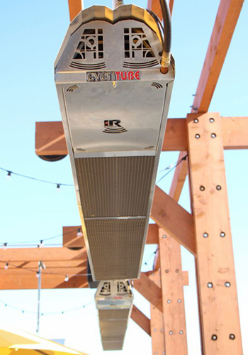 Two Natural Gas Heaters Mounted to the Posts of an Outdoor Pergola