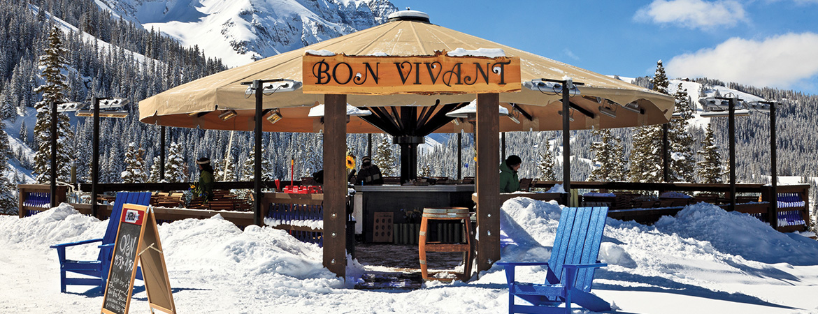 a snowy landscape with a gazebo featuring short wave outdoor heaters